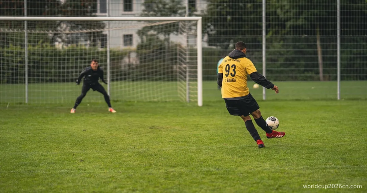 man in yellow and black soccer jersey kicking soccer ball on green grass field during daytime