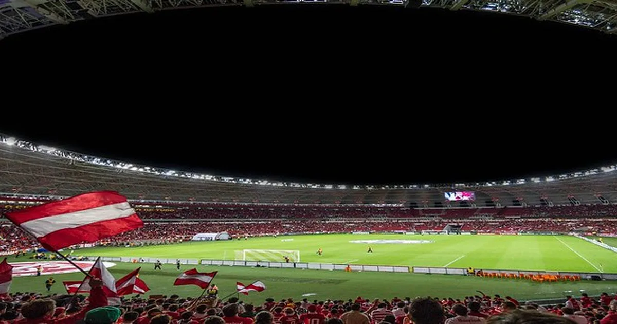 Professional football transfer news header image, blurred background of a Bundesliga stadi